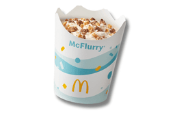 McFlurry®  Lion®  o smaku waniliowym z polewą o smaku czekoladowym